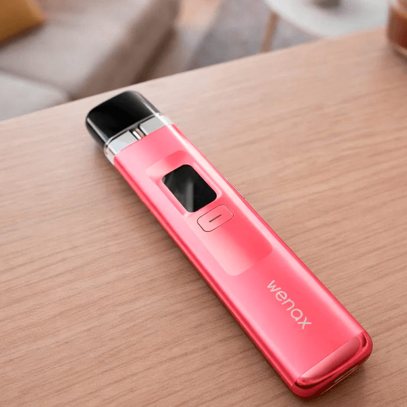 Розовый GeekVape Wenax Q на столе